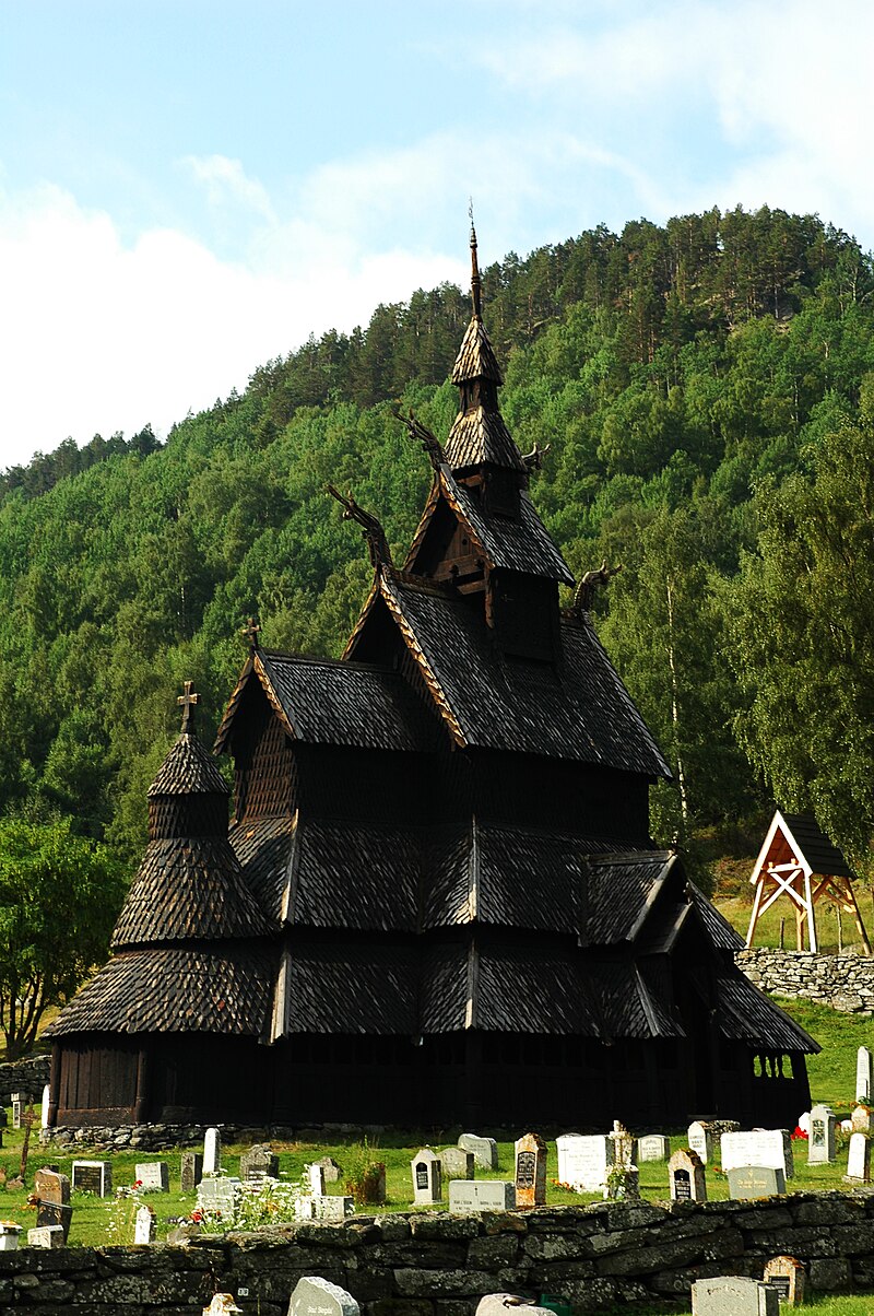 Exterior view of Borgund Stave Church with layered wooden roofs