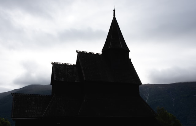 Urnes Stave Church exterior view overlooking Lustrafjord